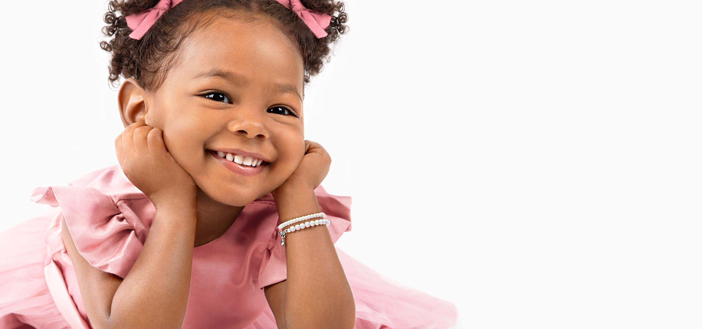 Child Receiving 14K Gold Screw-Back Earrings