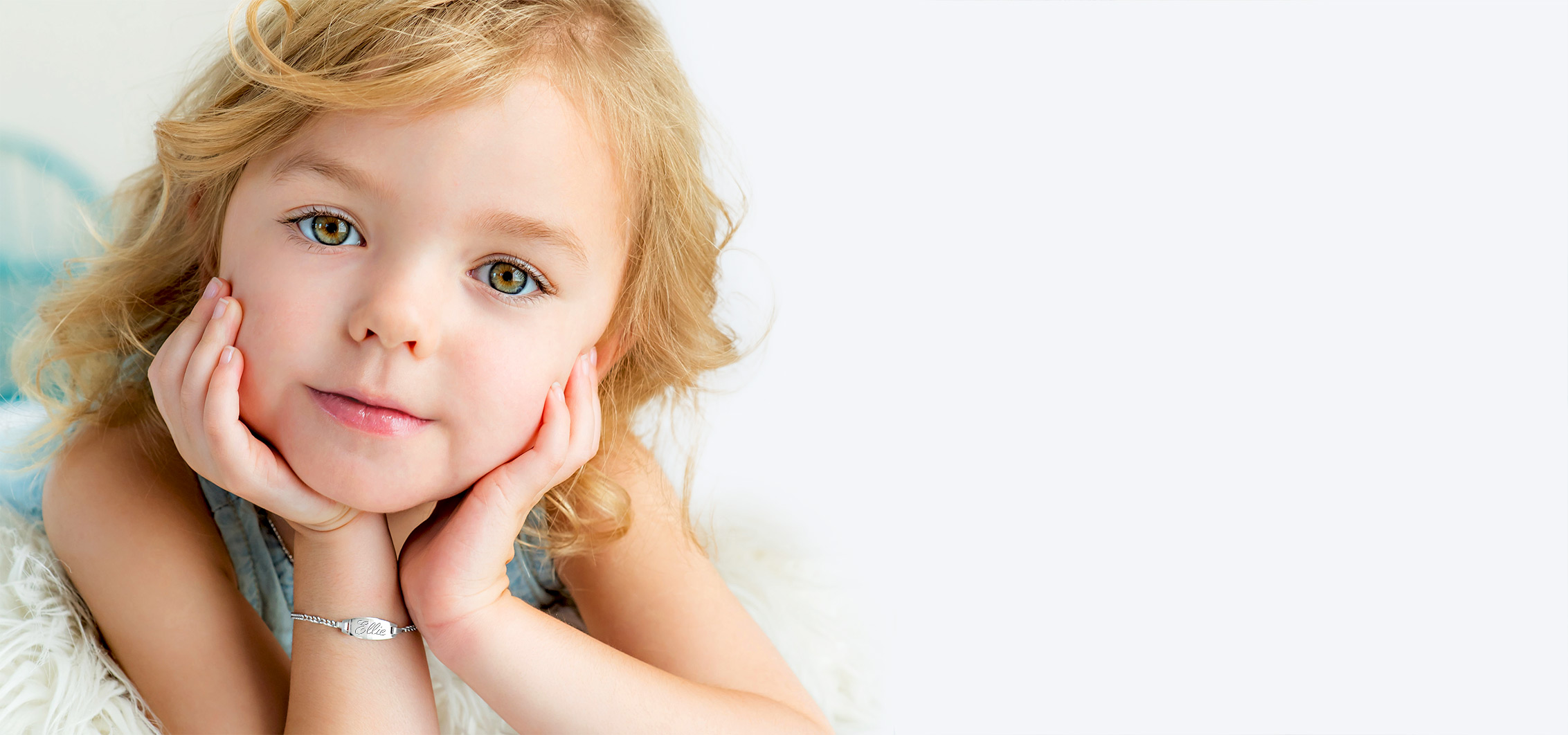 Child wearing personalized ID name bracelet